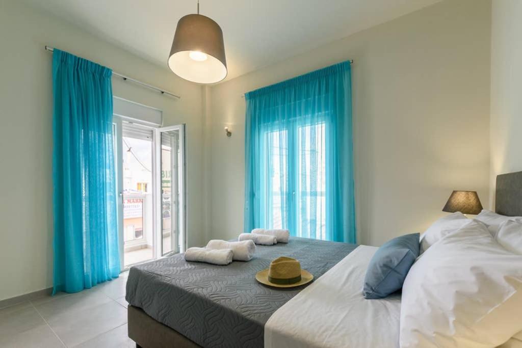 Posteľ alebo postele v izbe v ubytovaní Seashell Apt 2