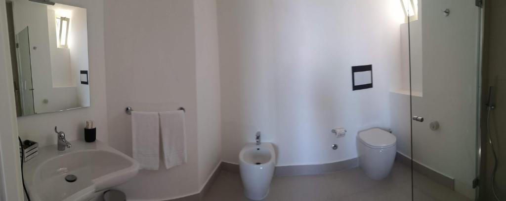 A bathroom at Athena Charming Rooms