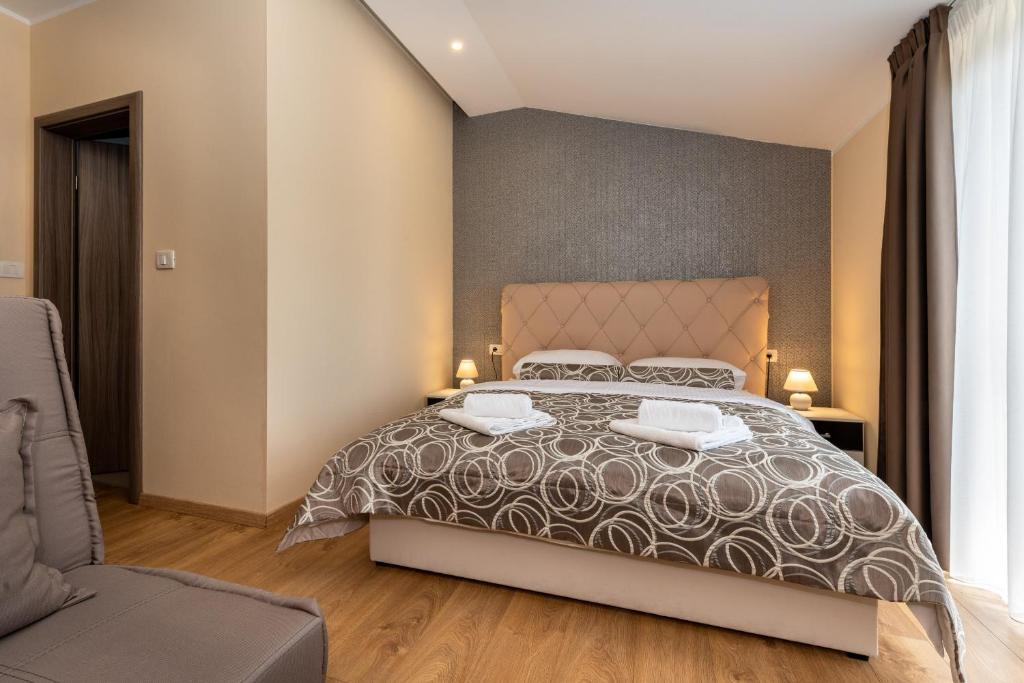Posteľ alebo postele v izbe v ubytovaní Hotel Tomažići