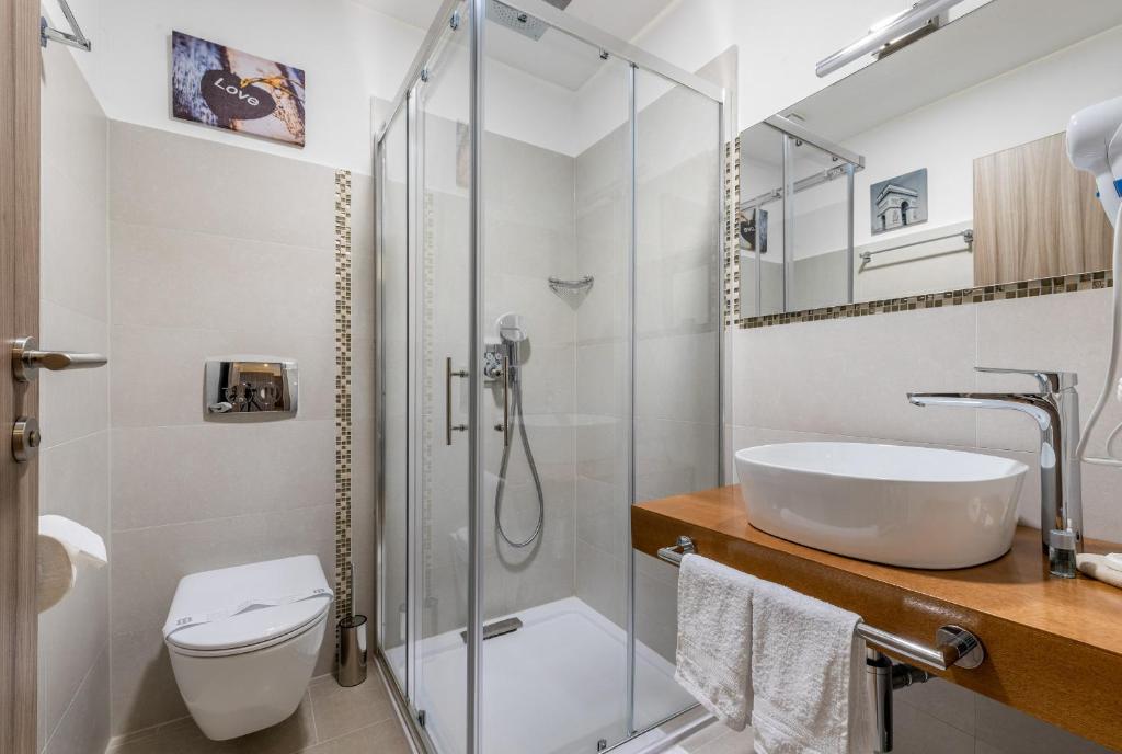 Kúpeľňa v ubytovaní Hotel Tomažići