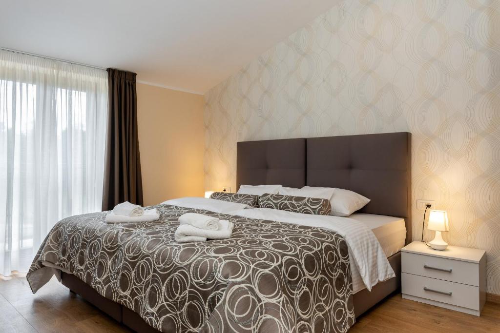 Posteľ alebo postele v izbe v ubytovaní Hotel Tomažići