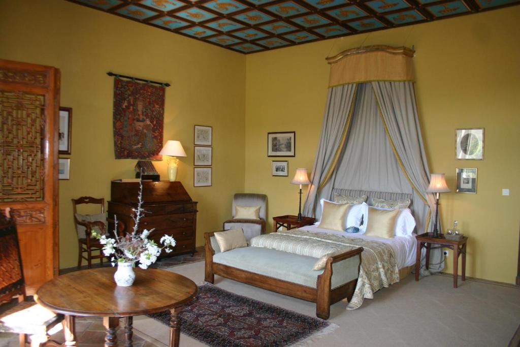 Postel nebo postele na pokoji v ubytování Château de Camon