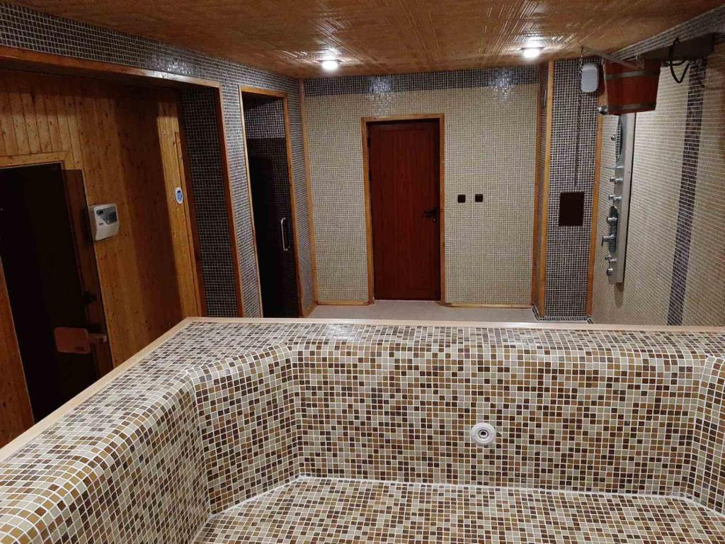 A bed or beds in a room at Incanto Apartments