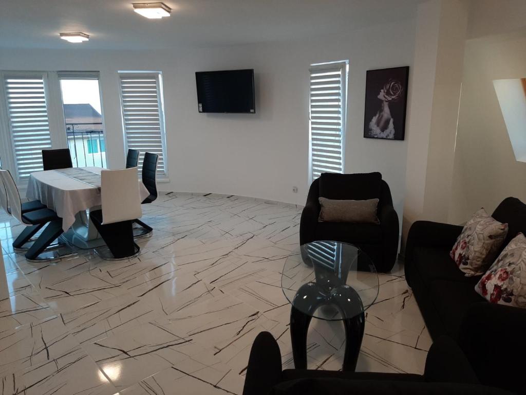 A television and/or entertainment centre at Incanto Apartments
