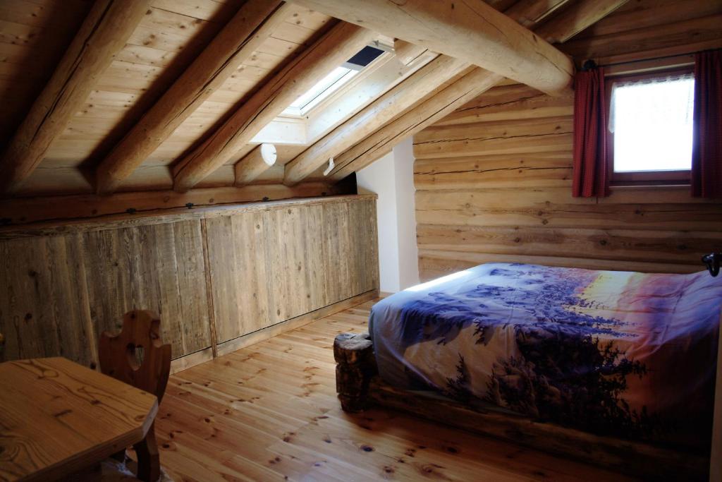 Postel nebo postele na pokoji v ubytování BAITA NONNO GHINO