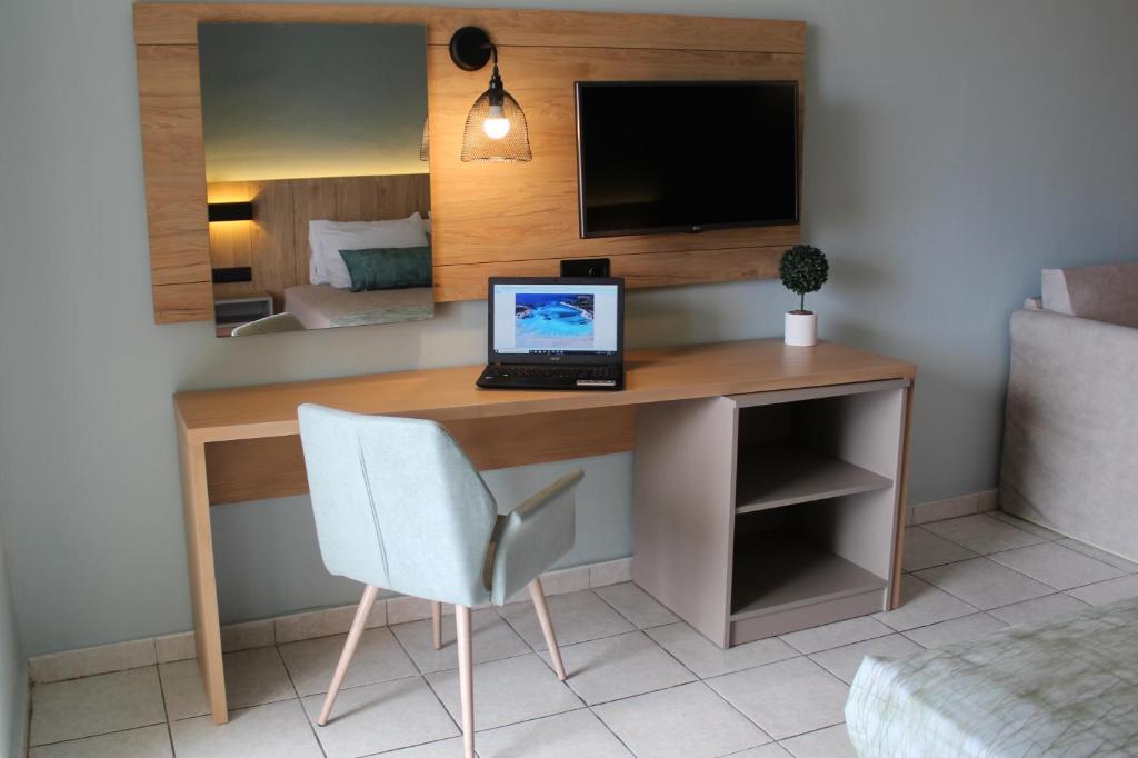 TV a/nebo společenská místnost v ubytování Poledas Apartments