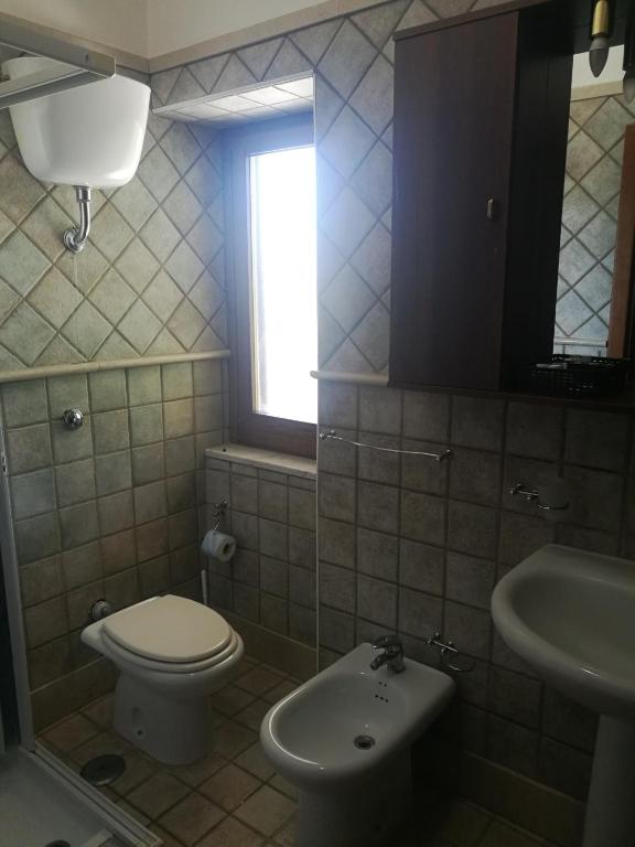 Koupelna v ubytování Garden Inn