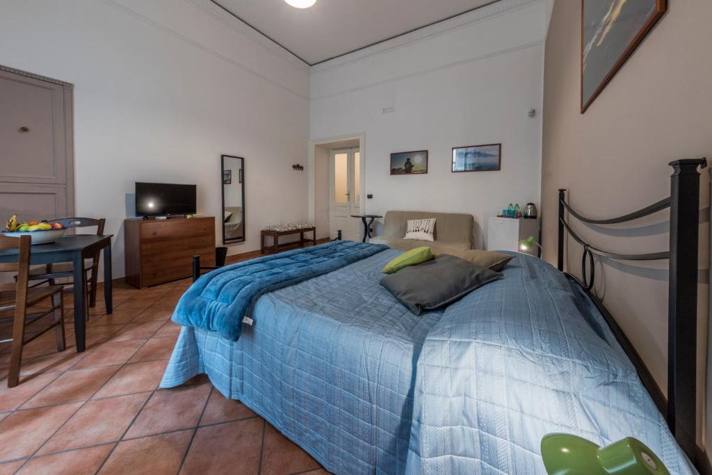A bed or beds in a room at 'Na Siesta