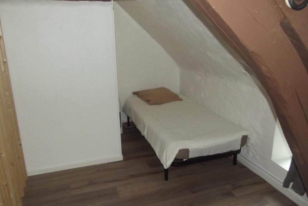 Postel nebo postele na pokoji v ubytování Le Domaine de JAUGY