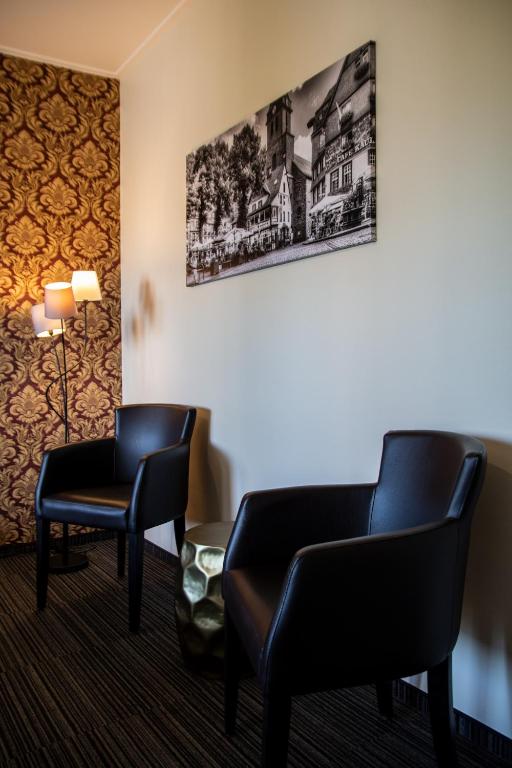 Ein Sitzbereich in der Unterkunft Hotel De Lange Man Monschau Eifel