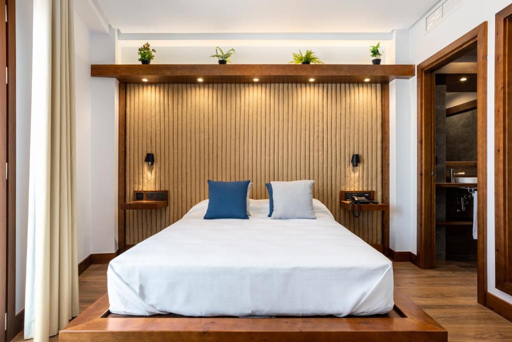 Postel nebo postele na pokoji v ubytování Hotel Antantie