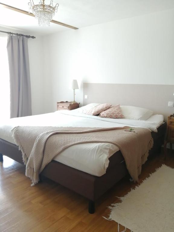 Postel nebo postele na pokoji v ubytování Guesthouse La maison de Fille