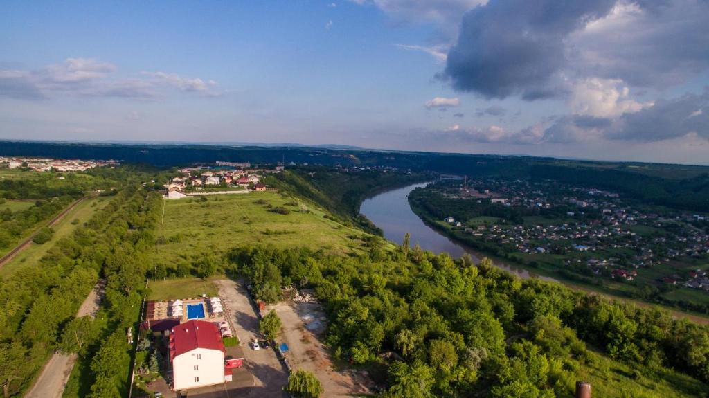 an aerial view of a river and a city at Оазис in Zalishchyky