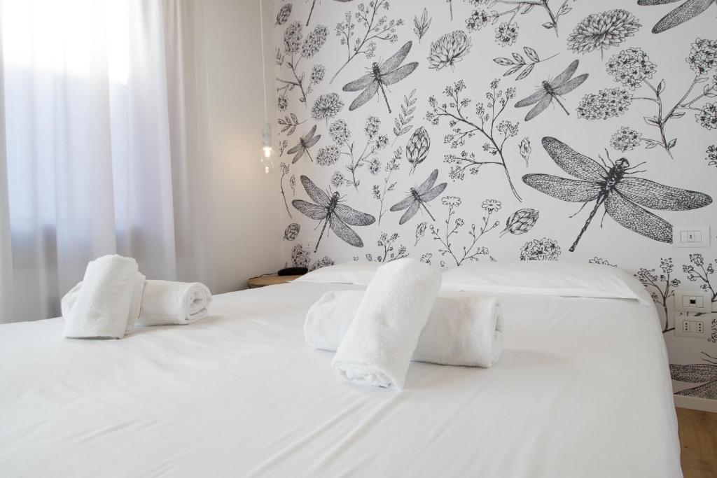 Postel nebo postele na pokoji v ubytování Hotel Rio