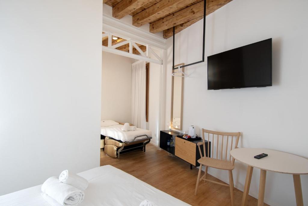 TV a/nebo společenská místnost v ubytování Hotel Rio