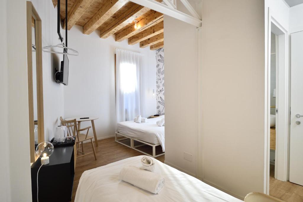 Postel nebo postele na pokoji v ubytování Hotel Rio