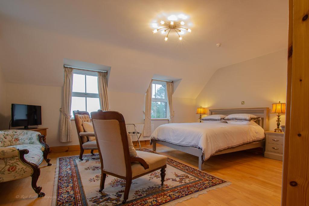 Postel nebo postele na pokoji v ubytování Lis-Ardagh Lodge