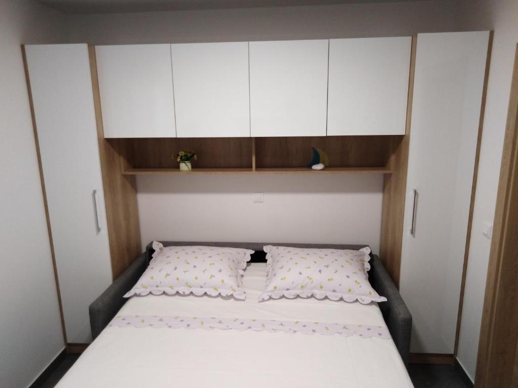 Postel nebo postele na pokoji v ubytování Apartment Valentina