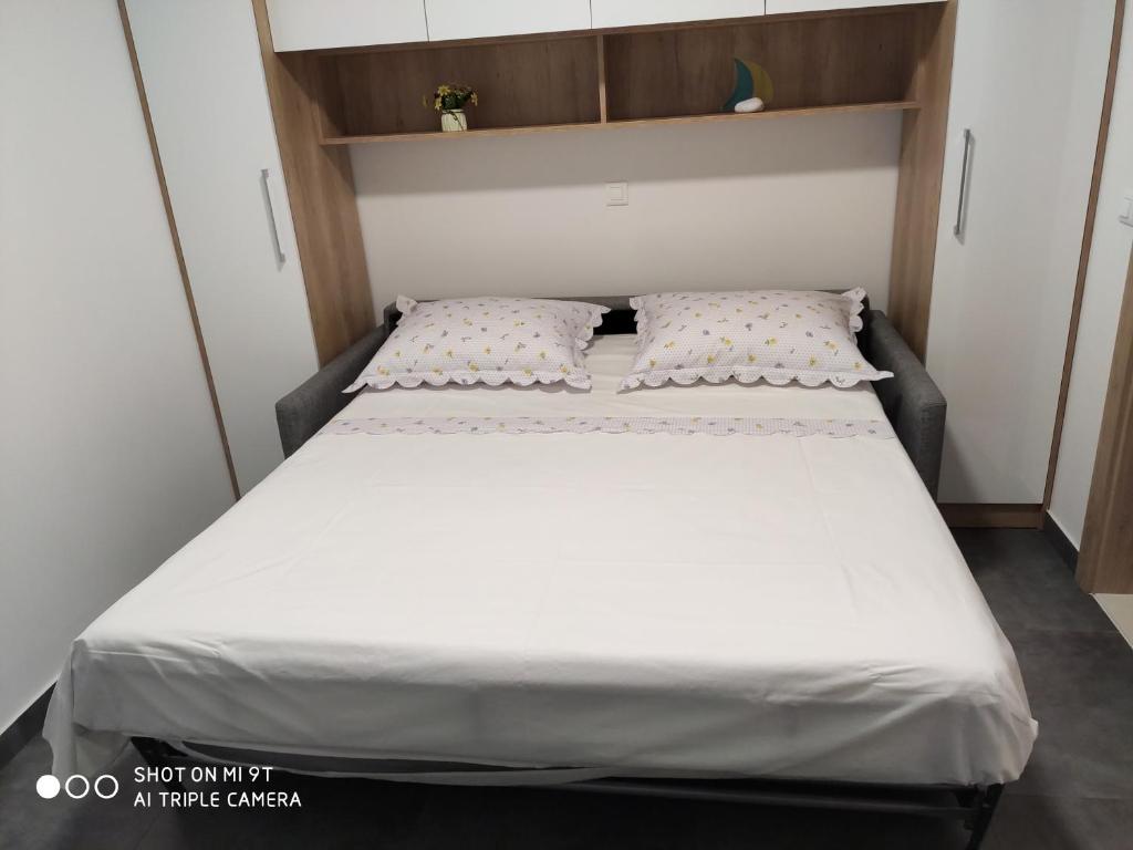 Postel nebo postele na pokoji v ubytování Apartment Valentina