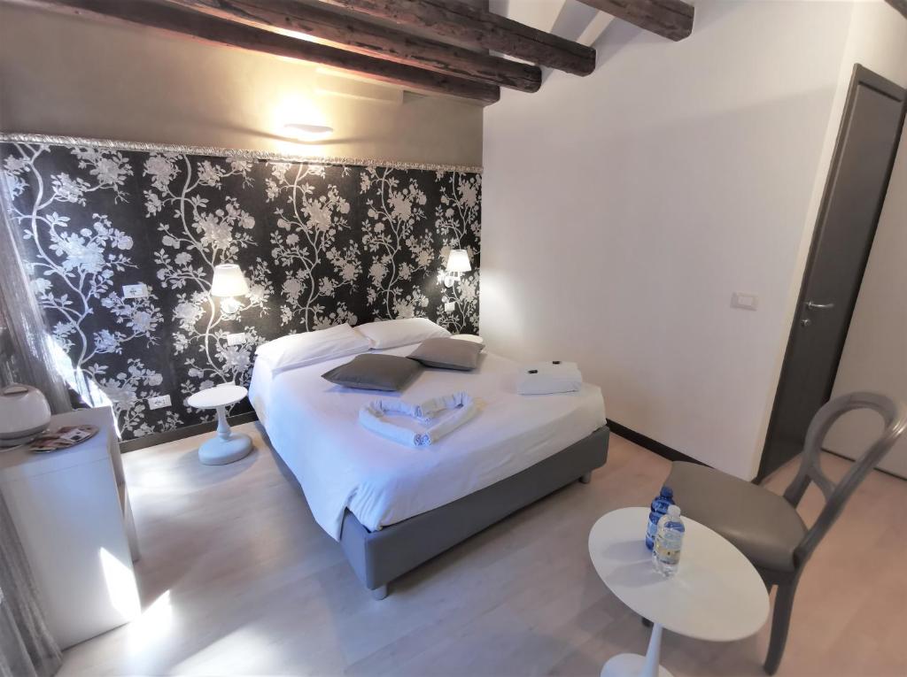 Postel nebo postele na pokoji v ubytování Hotel Rio