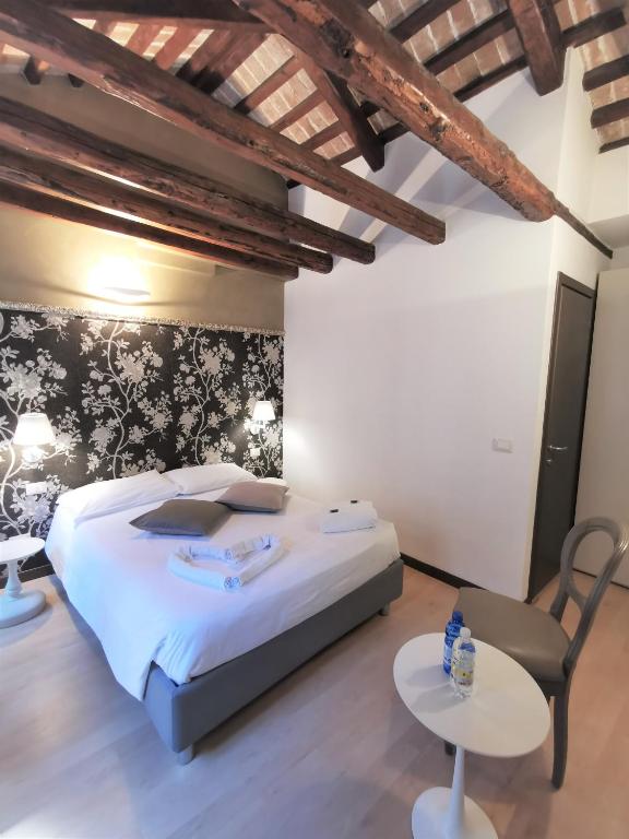 Postel nebo postele na pokoji v ubytování Hotel Rio