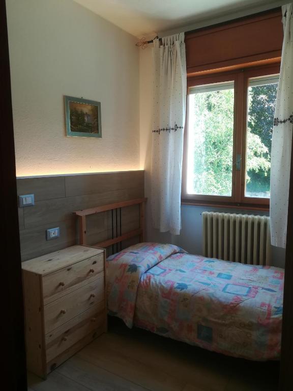 Postel nebo postele na pokoji v ubytování Albergo Ristorante Sargas