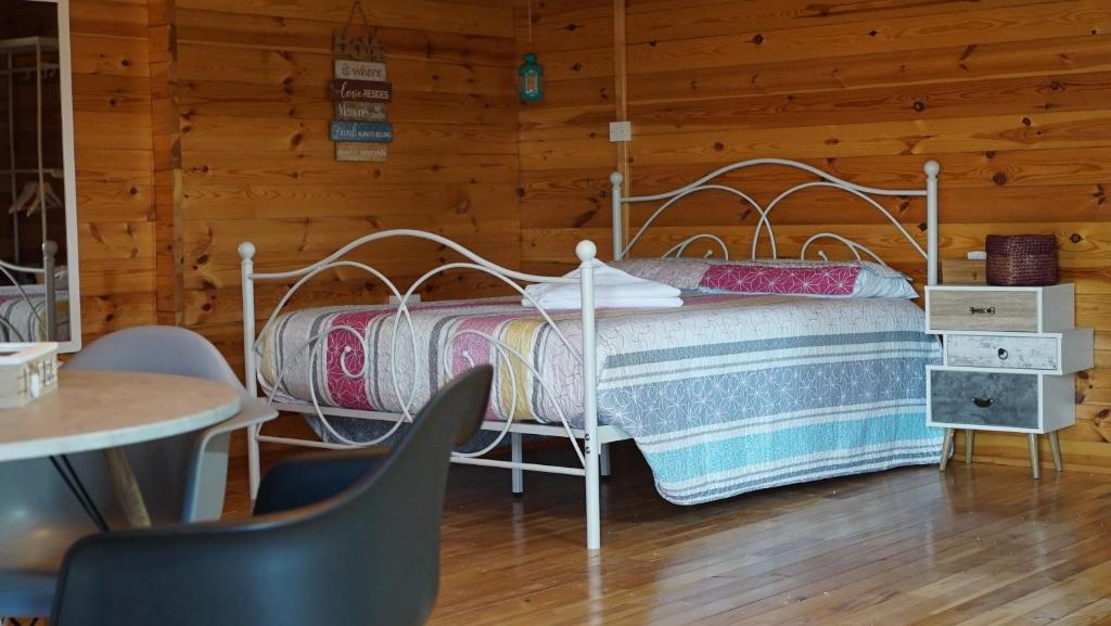 Postel nebo postele na pokoji v ubytování Happy Glamping Cy