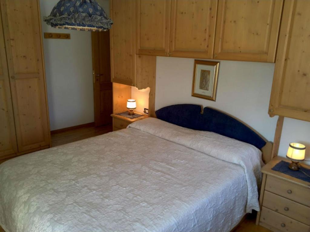 Postel nebo postele na pokoji v ubytování Casa Pergher