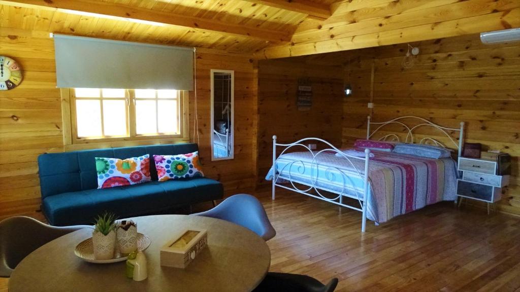 Postel nebo postele na pokoji v ubytování Happy Glamping Cy