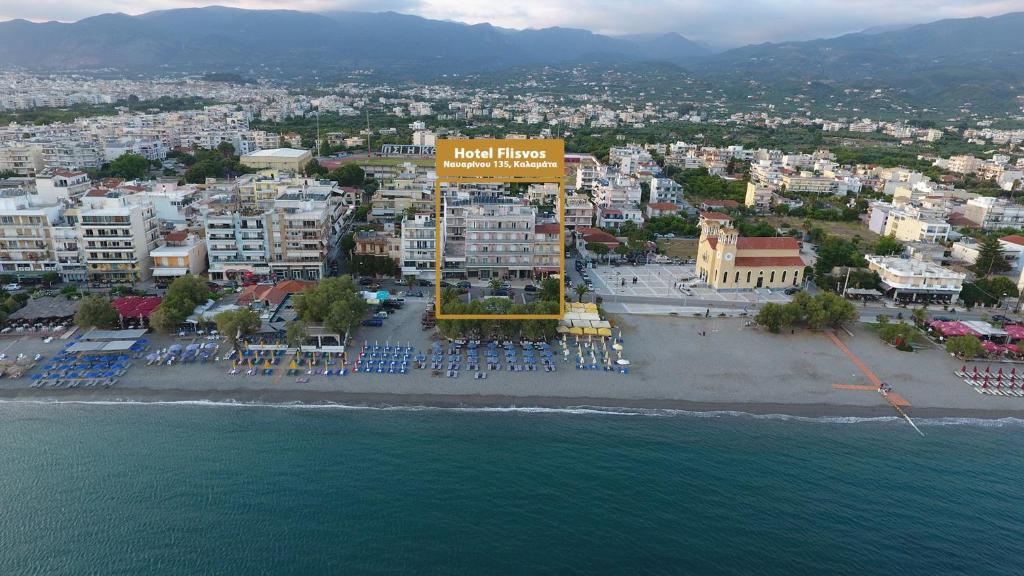 an aerial view of a city and the ocean at Hotel Flisvos in Kalamata