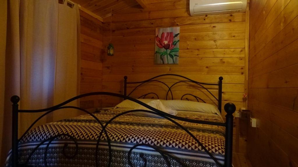 Postel nebo postele na pokoji v ubytování Happy Glamping Cy