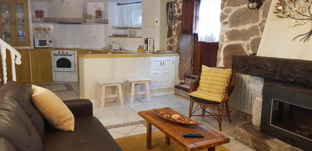 Kuchyň nebo kuchyňský kout v ubytování Casa Rualeira