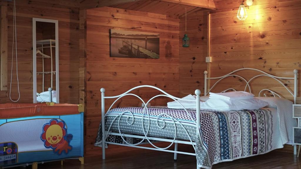Postel nebo postele na pokoji v ubytování Happy Glamping Cy