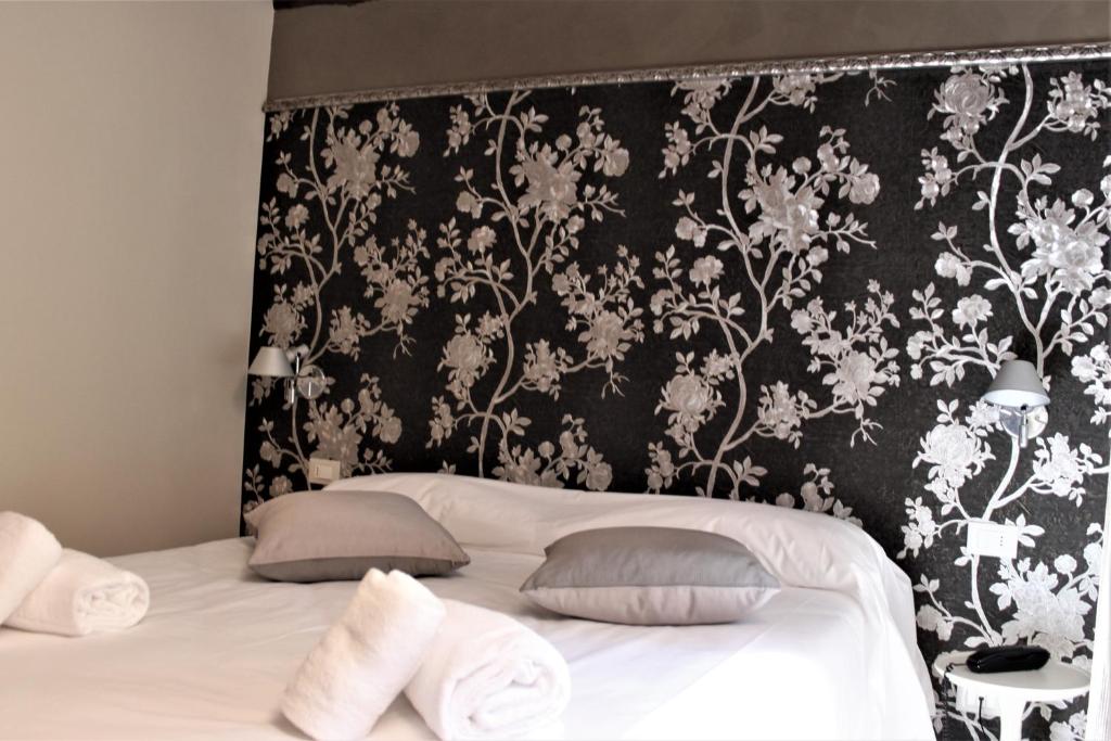 Postel nebo postele na pokoji v ubytování Hotel Rio