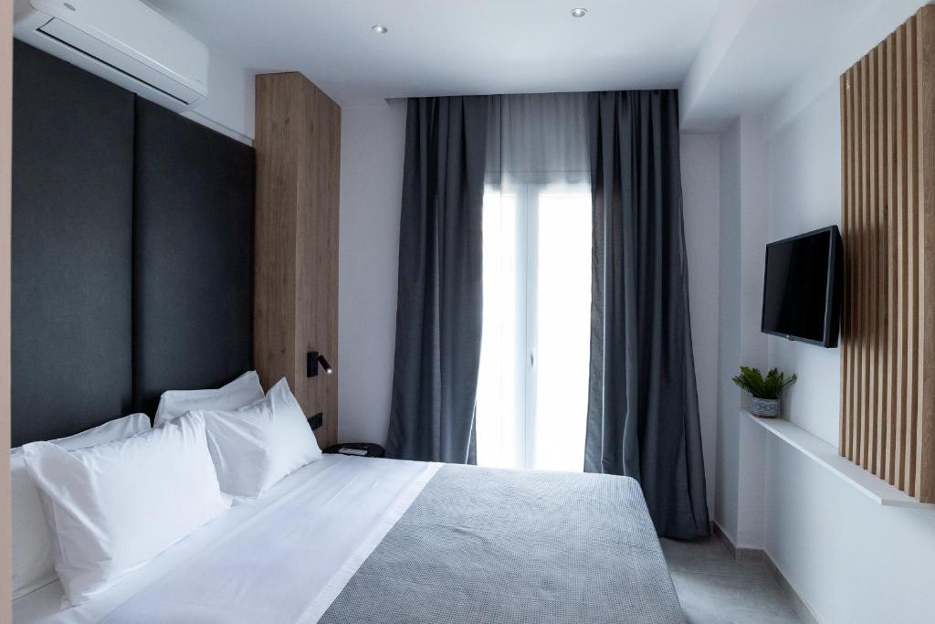 A bed or beds in a room at White 9