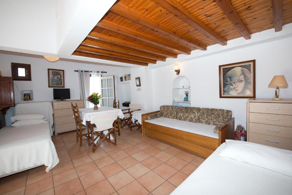A bed or beds in a room at Sunday Summer House