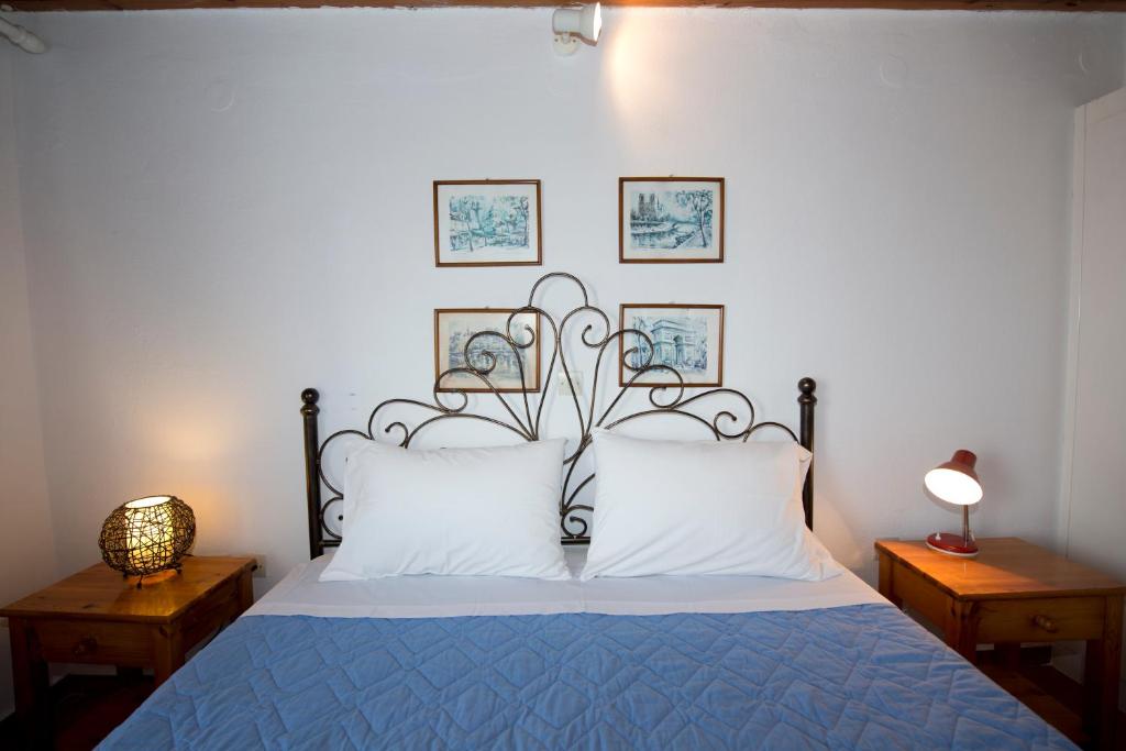 A bed or beds in a room at Sunday Summer House