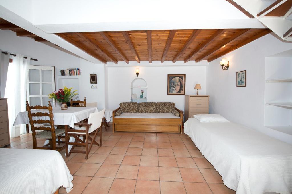 A bed or beds in a room at Sunday Summer House