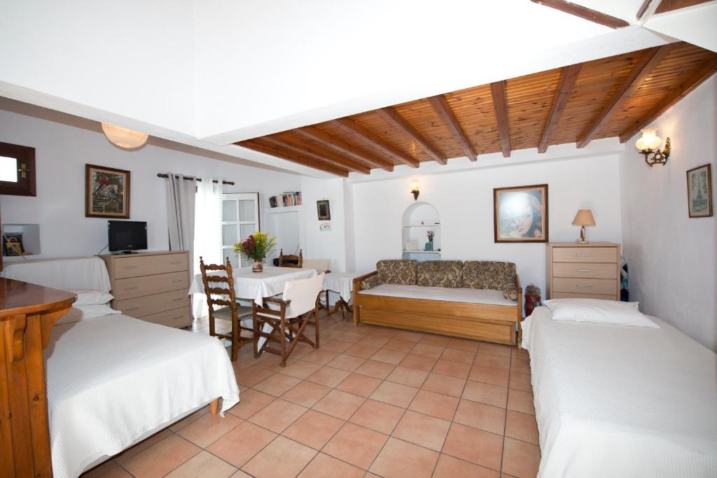 A bed or beds in a room at Sunday Summer House