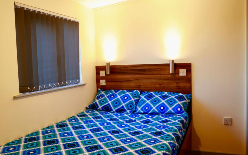 Postel nebo postele na pokoji v ubytování The Liverpool Pod Travel Hostel