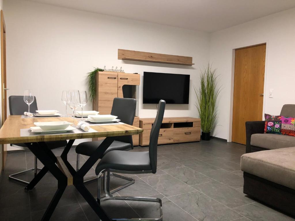 Televízia a/alebo spoločenská miestnosť v ubytovaní Ferienwohnung CeLina