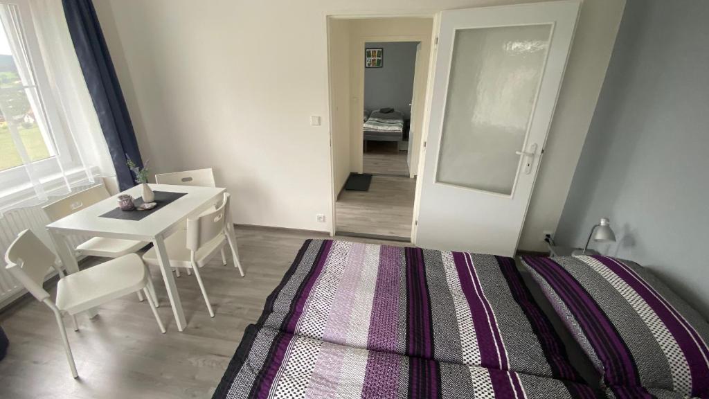 Postel nebo postele na pokoji v ubytování Penzion Kamejk