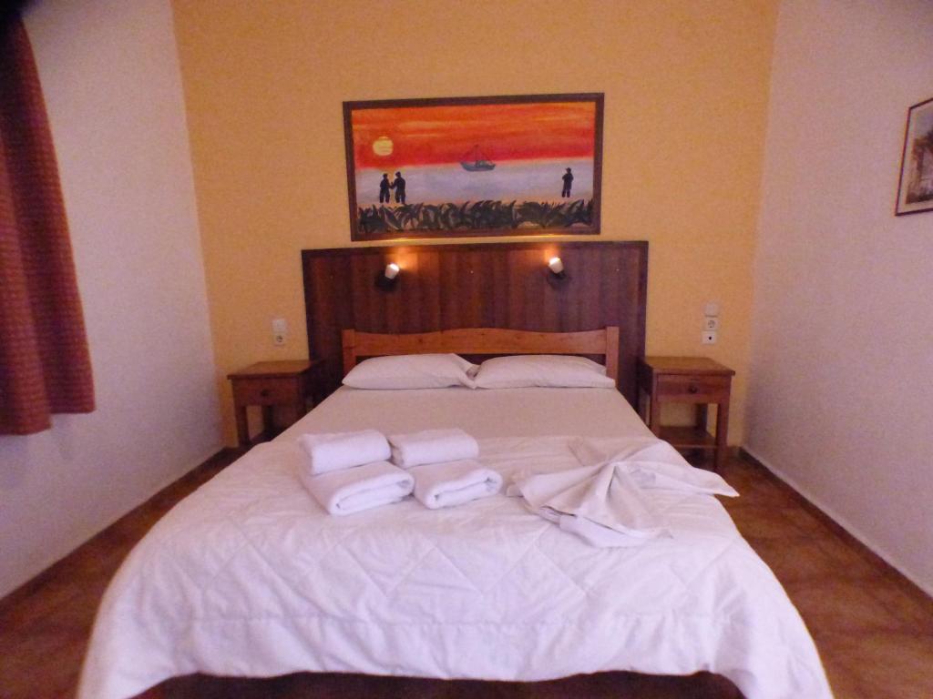 Ένα ή περισσότερα κρεβάτια σε δωμάτιο στο Eleni Apartments