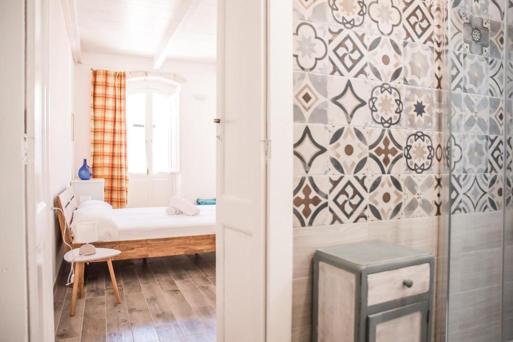 Postel nebo postele na pokoji v ubytování B&B LE TRE CHIOCCIOLE