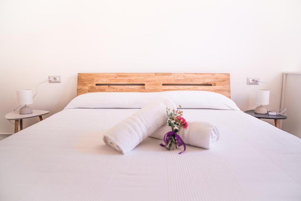 Postel nebo postele na pokoji v ubytování B&B LE TRE CHIOCCIOLE