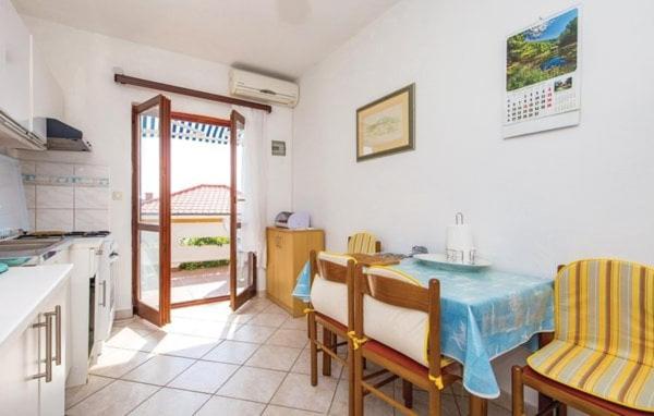 Kuchyň nebo kuchyňský kout v ubytování Apartments Luna