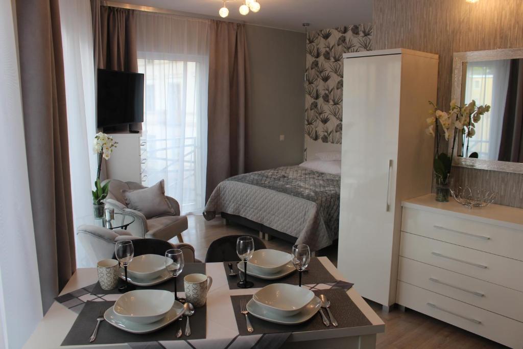 Posteľ alebo postele v izbe v ubytovaní Apartamenty Jagiellońska 23
