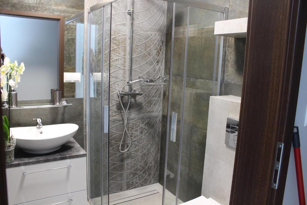 Kúpeľňa v ubytovaní Apartamenty Jagiellońska 23