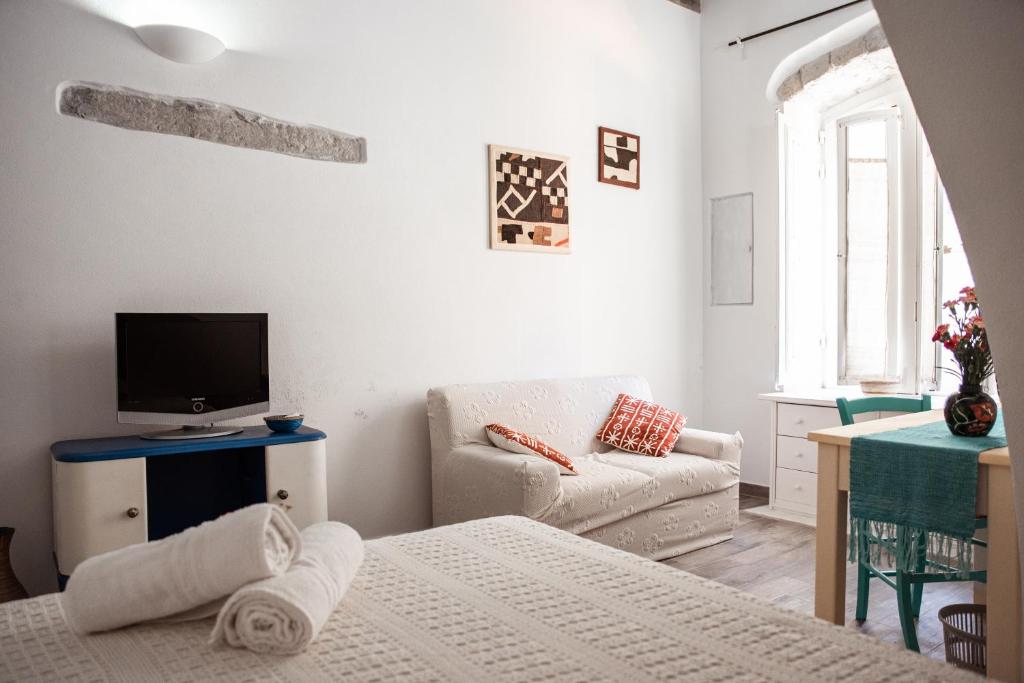 TV a/nebo společenská místnost v ubytování B&B LE TRE CHIOCCIOLE