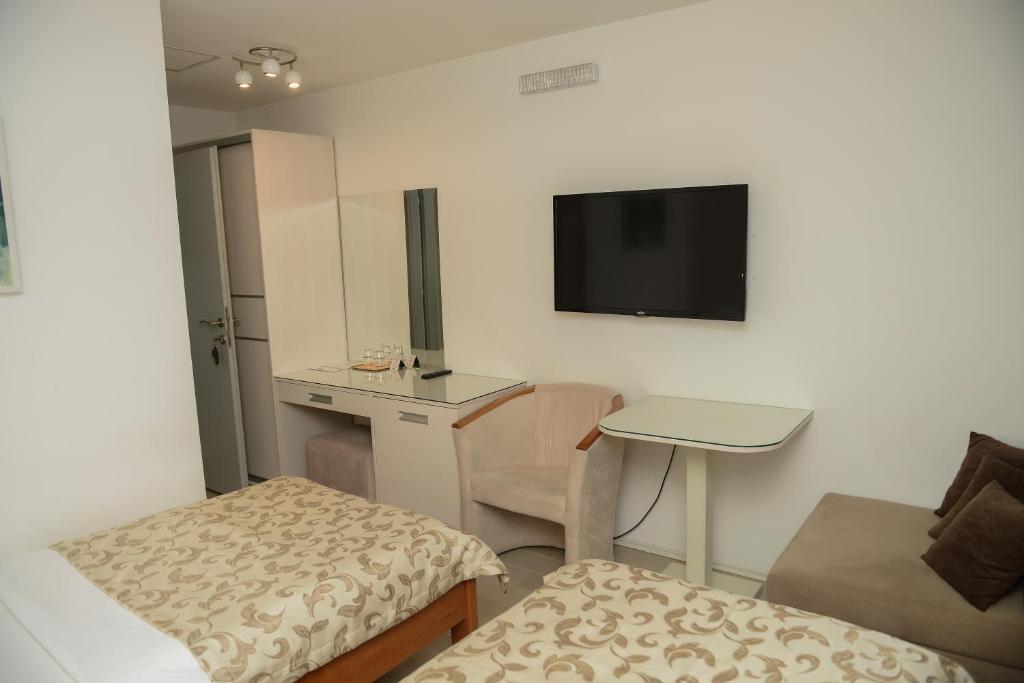 TV a/nebo společenská místnost v ubytování Hotel Sunce